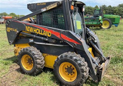 attaching a buck l218 skid steer|New Holland ls185b Quick Attach Issue .